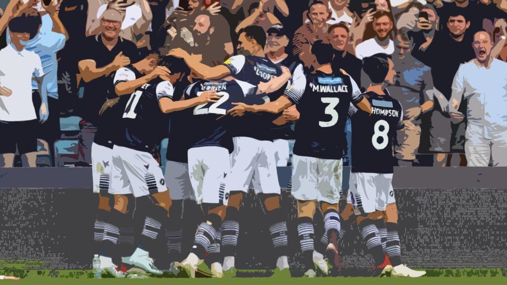 Millwall players celebrating with their fans